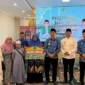 Bupati, Wakil Bupati, dan Sekda Barito Utara bersama jamaah umrah penerima hadiah dari Musabaqah Tilawatil Quran dan Hadis (MTQH) ke-33, pada acara pelepasan di Muara Teweh.