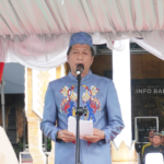 Sekda Barito Utara Drs. Muhlis, M.AP membacakan sambutan Gubernur Kalteng pada upacara Hari Jadi ke-69 Kalteng dan HKN ke-118 Tahun 2026