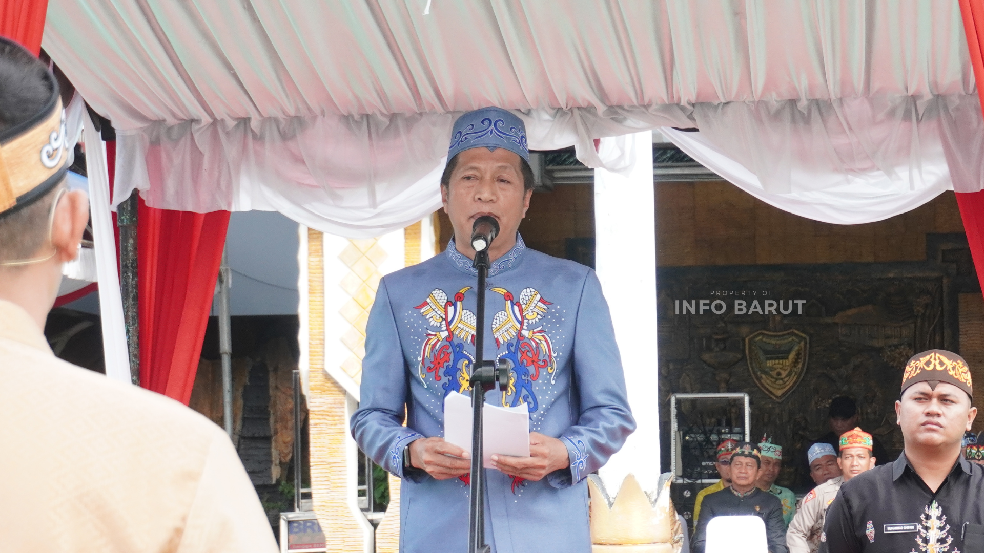 Sekda Barito Utara Drs. Muhlis, M.AP membacakan sambutan Gubernur Kalteng pada upacara Hari Jadi ke-69 Kalteng dan HKN ke-118 Tahun 2026