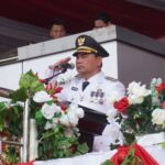Bupati Barito Utara H Shalahuddin memimpin upacara HUT ke-81 RI di Arena Tiara Batara
